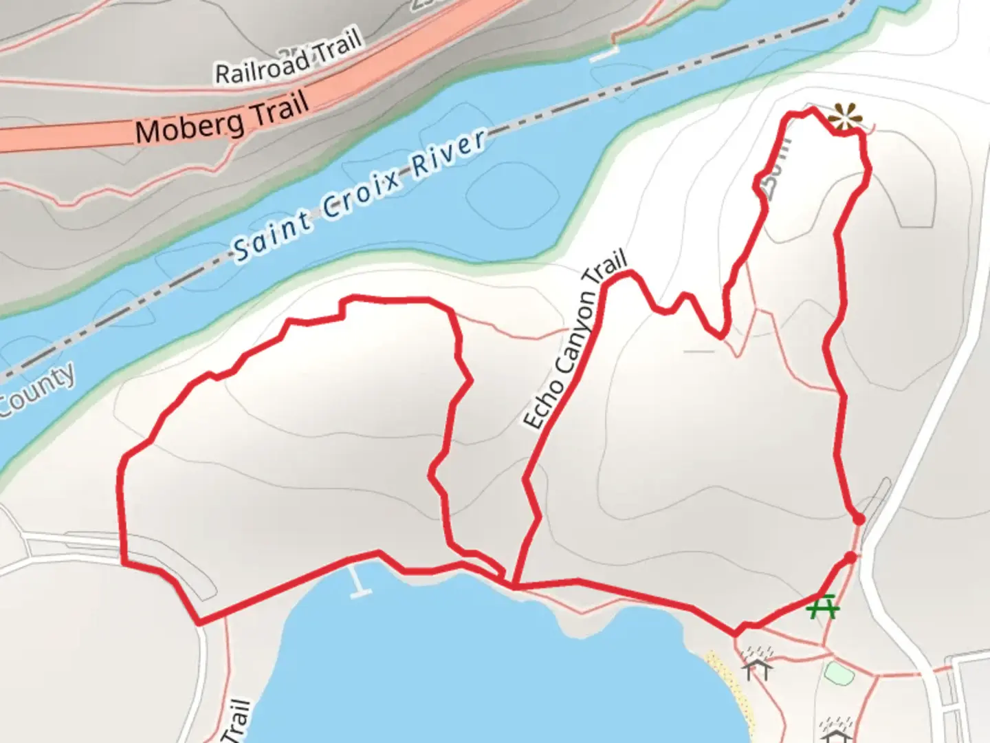 An image depicting the trail Lake O' the Dalles North Loop and its surrounding area.