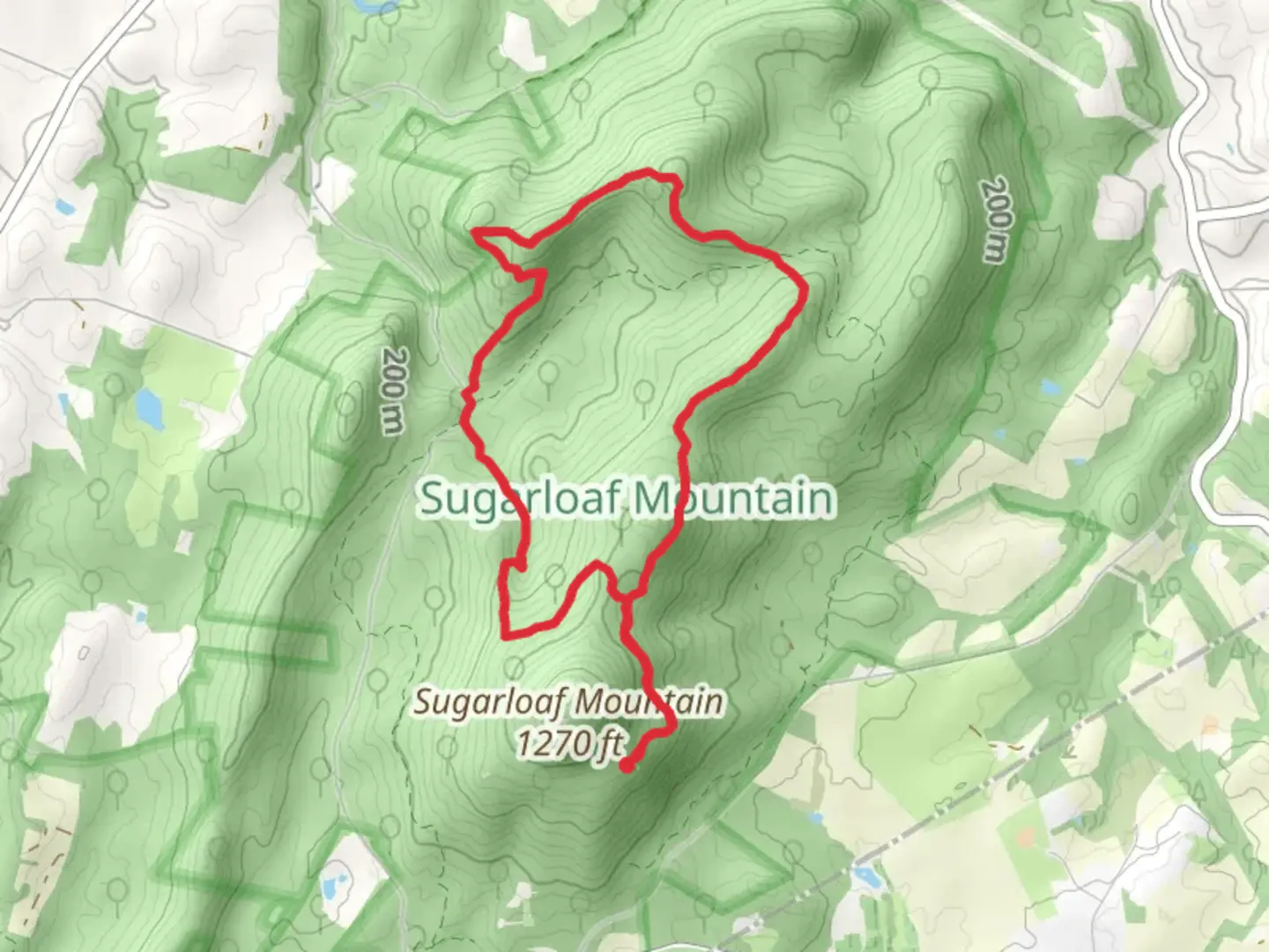 An image depicting the trail Northern Peaks Blue Loop Trail and its surrounding area.