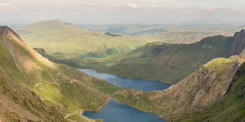 An image depicting the trail Sumitts Walk in Gwynedd and its surrounding area.