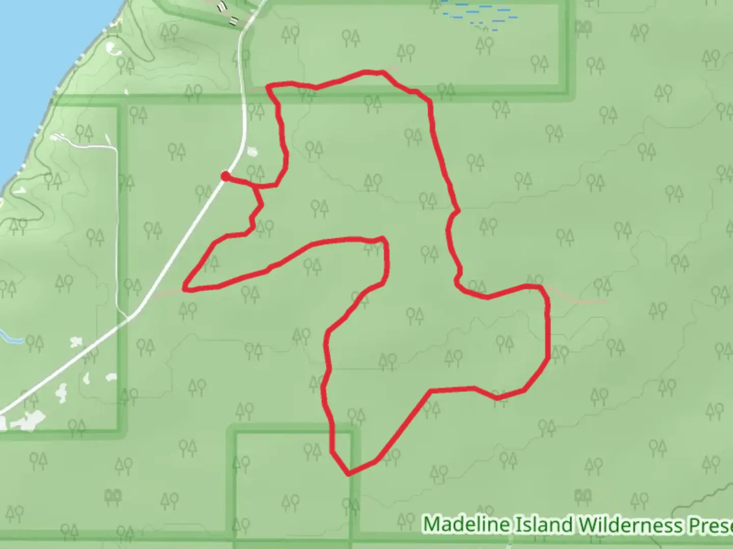 An image depicting the trail West Loop from North Shore Road and its surrounding area.