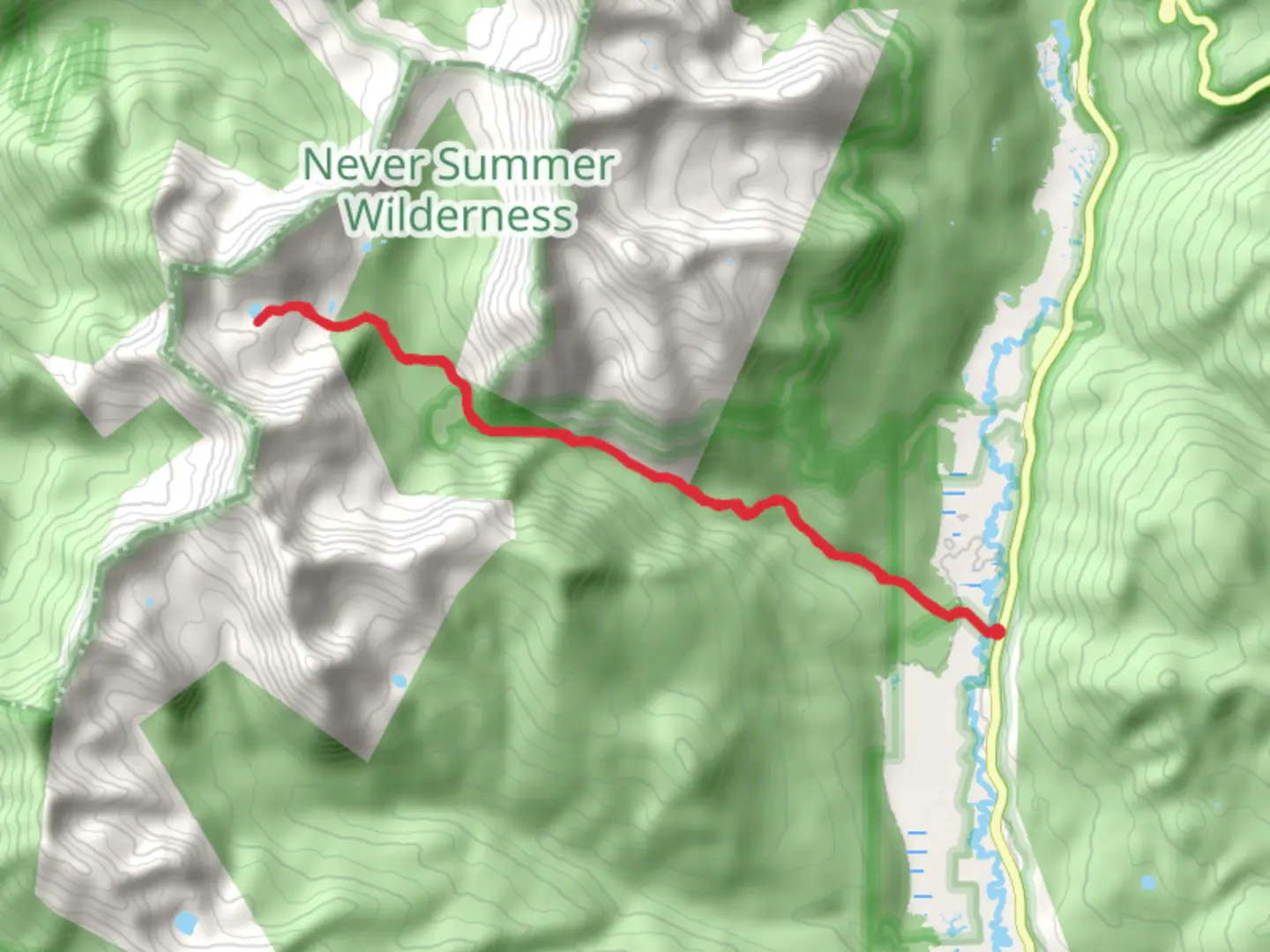 An image depicting the trail Parika Lake via Baker Gulch Trail and its surrounding area.