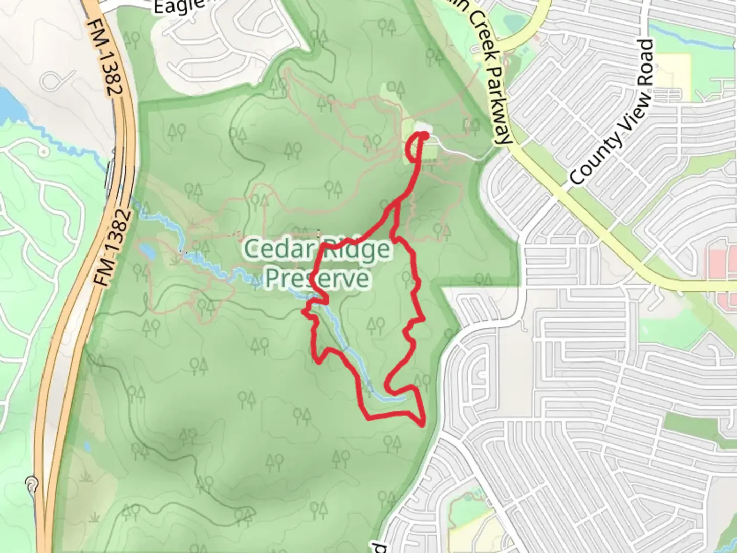 An image depicting the trail Cedar Brake and Catail Pond Loop Trail and its surrounding area.