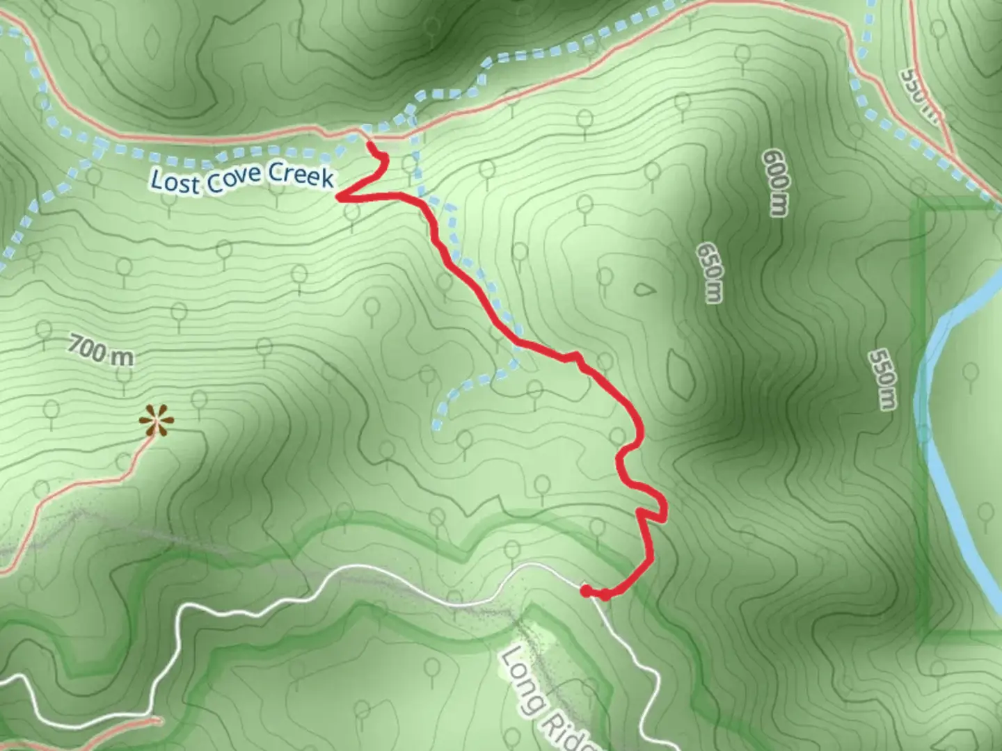 An image depicting the trail Hunt Fish Falls and its surrounding area.