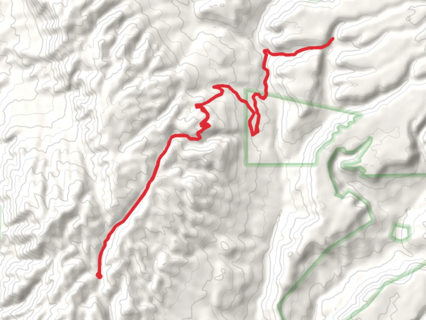 An image depicting the trail Smokey Bear Hill and its surrounding area.