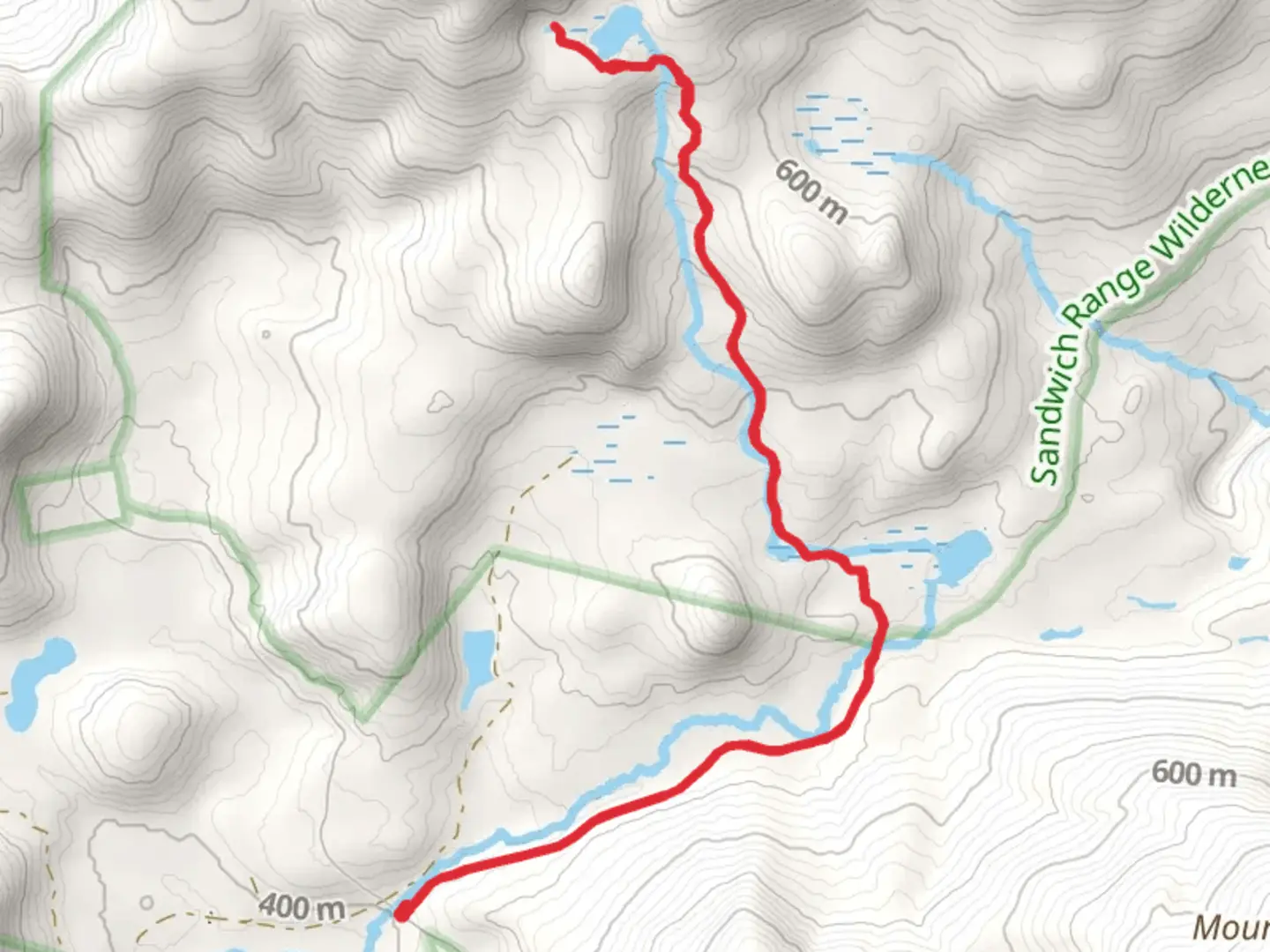 An image depicting the trail Black Mountain Pond Trail and its surrounding area.
