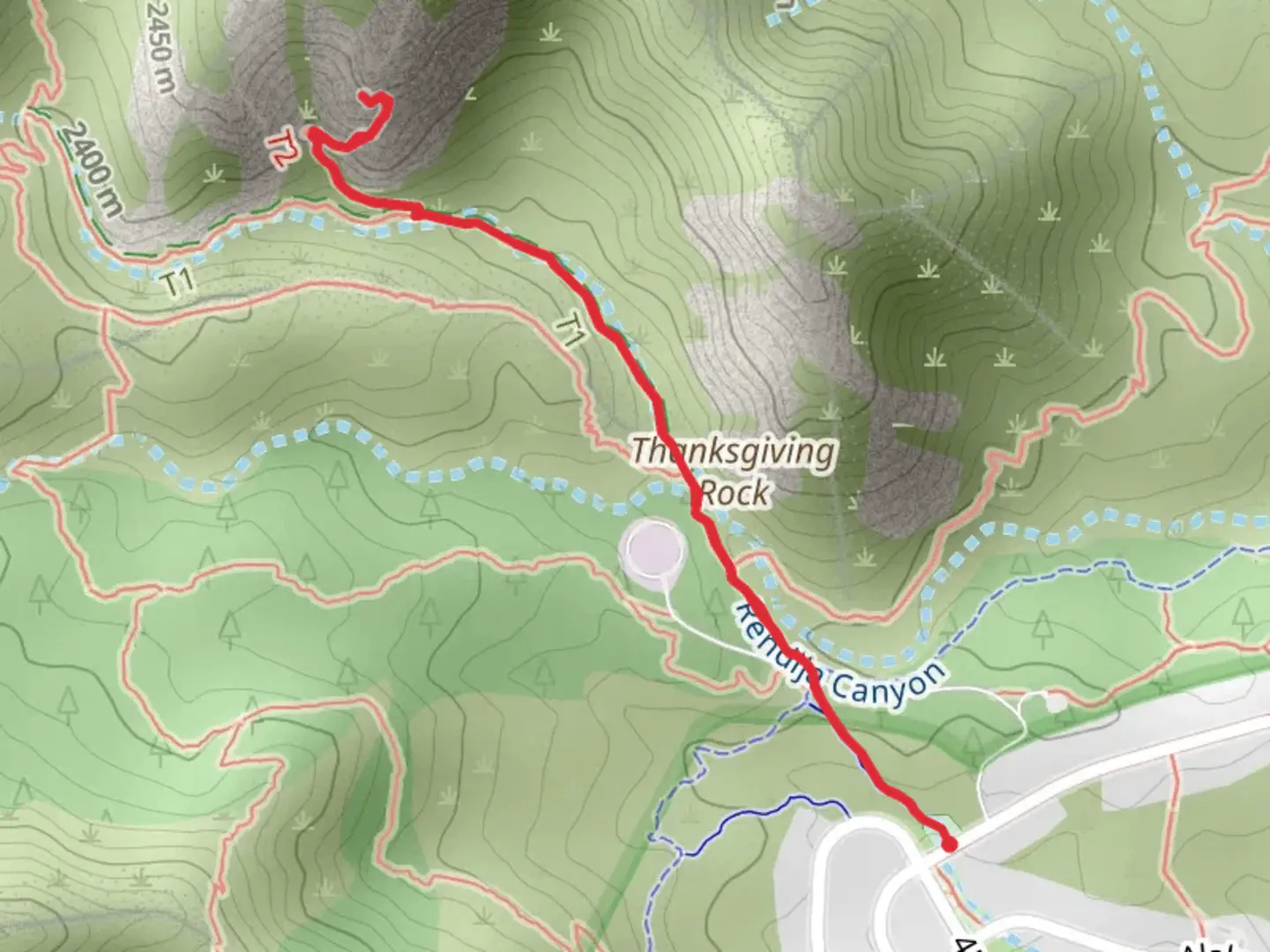 An image depicting the trail Natural Arch Trail via Mitchell Trail and its surrounding area.
