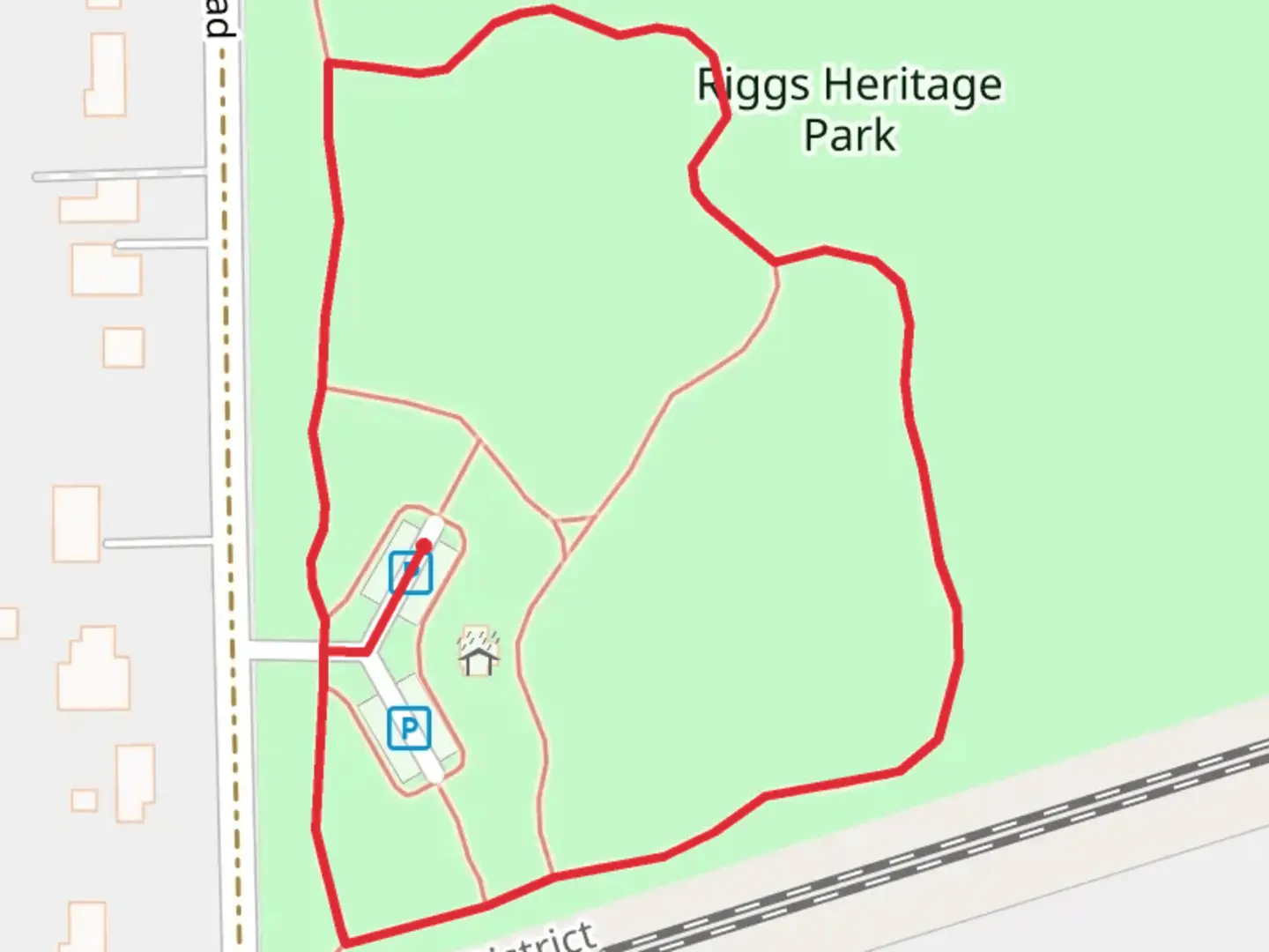 An image depicting the trail Riggs Heritage Park Loop and its surrounding area.