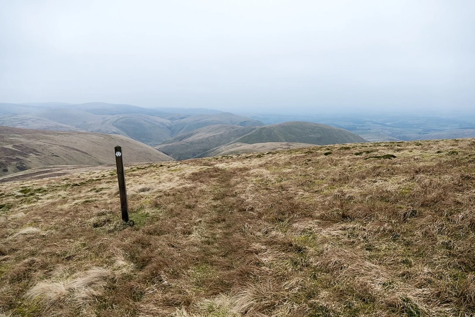 An image depicting the trail Comb Head and Lowther Hill from Durisdeer and its surrounding area.
