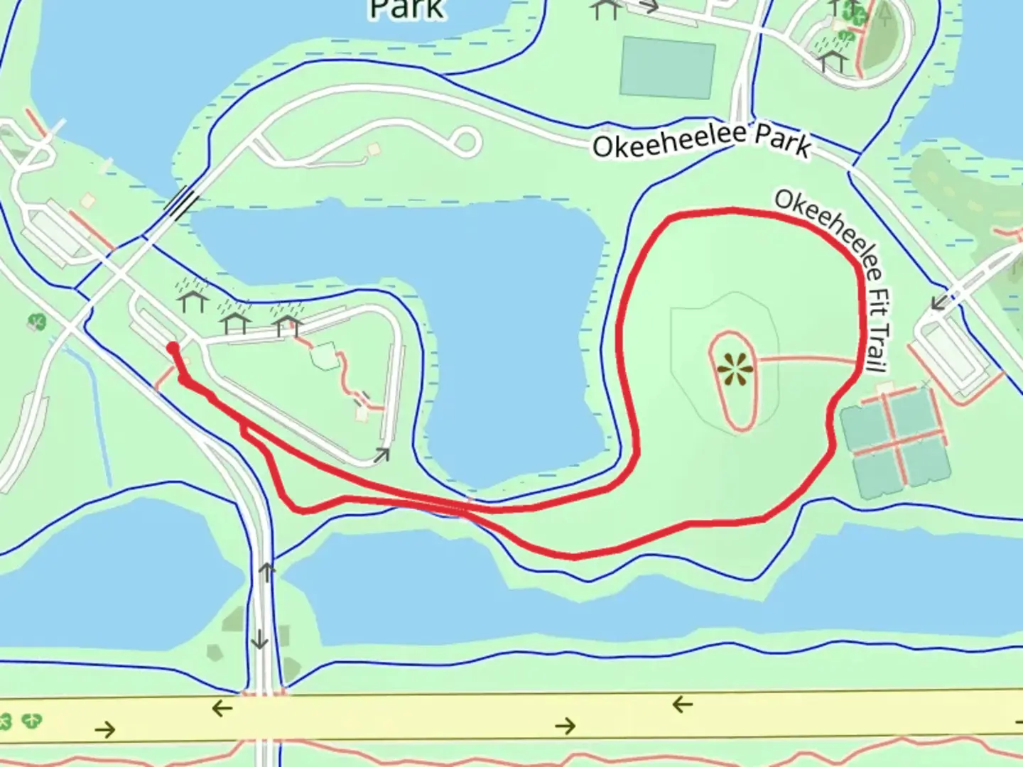 An image depicting the trail Okeeheelee Fit Loop Trail and its surrounding area.