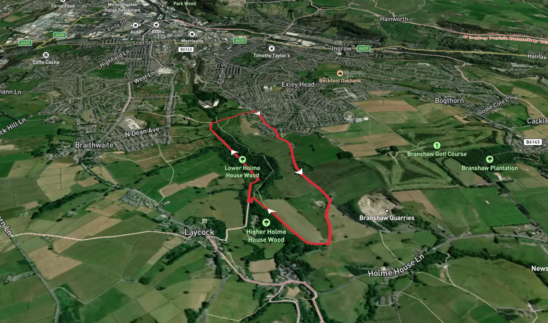 An image depicting the trail Lower Holme House Wood Loop and its surrounding area.