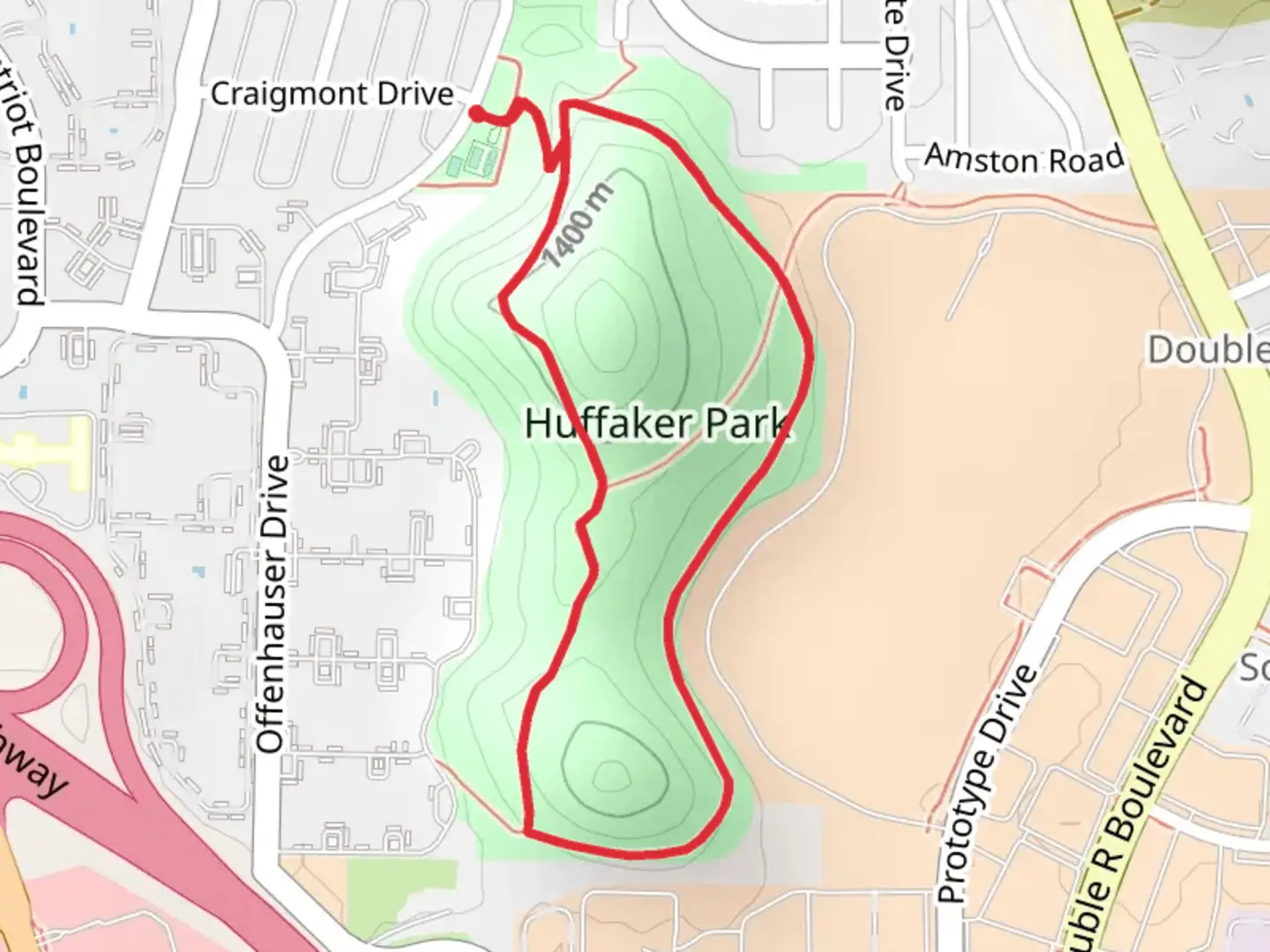 An image depicting the trail Huffaker Park Lookout Loop Trail and its surrounding area.