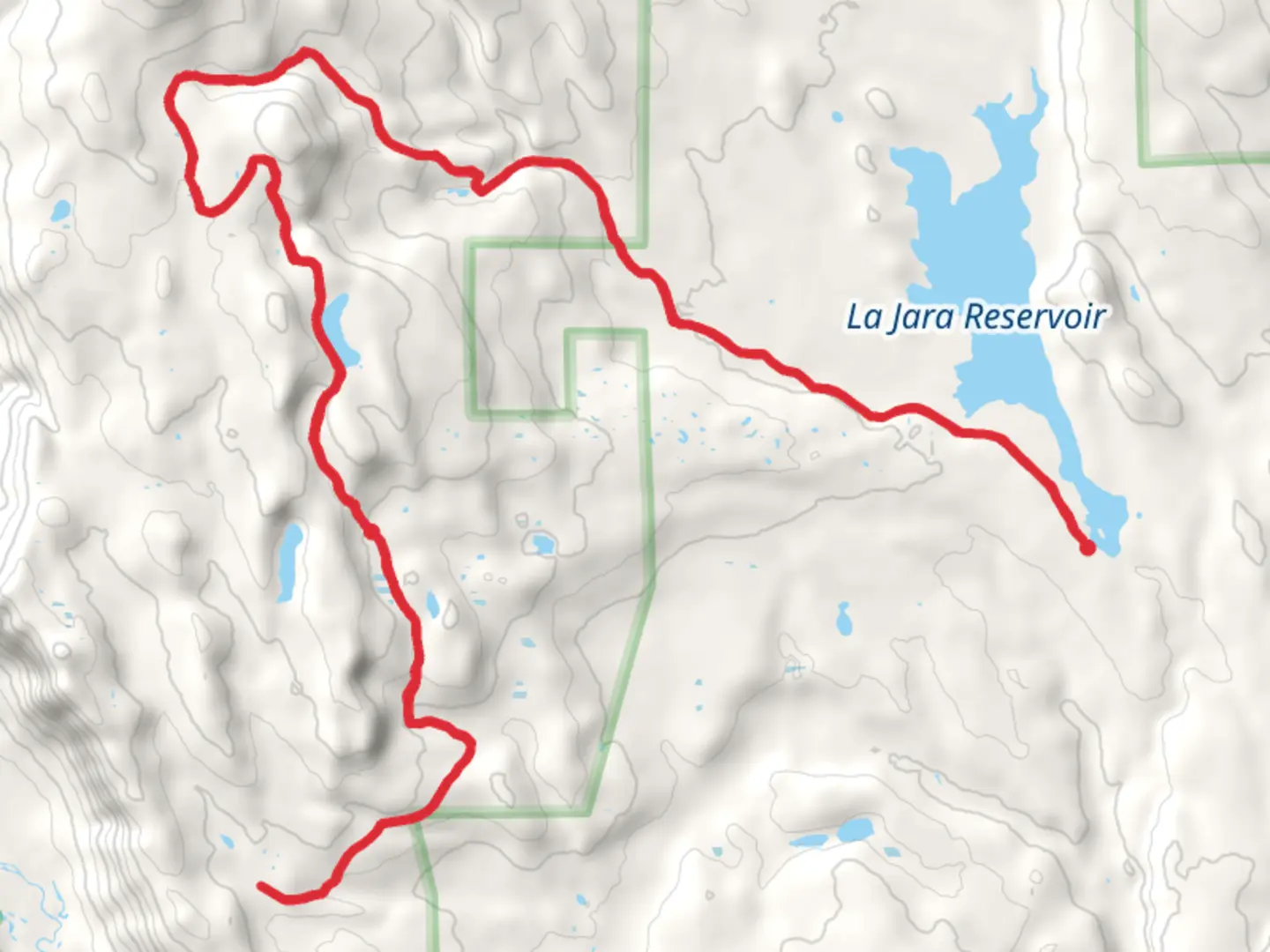 An image depicting the trail La Jara Reservoir and Empedrado Lake Trail and its surrounding area.