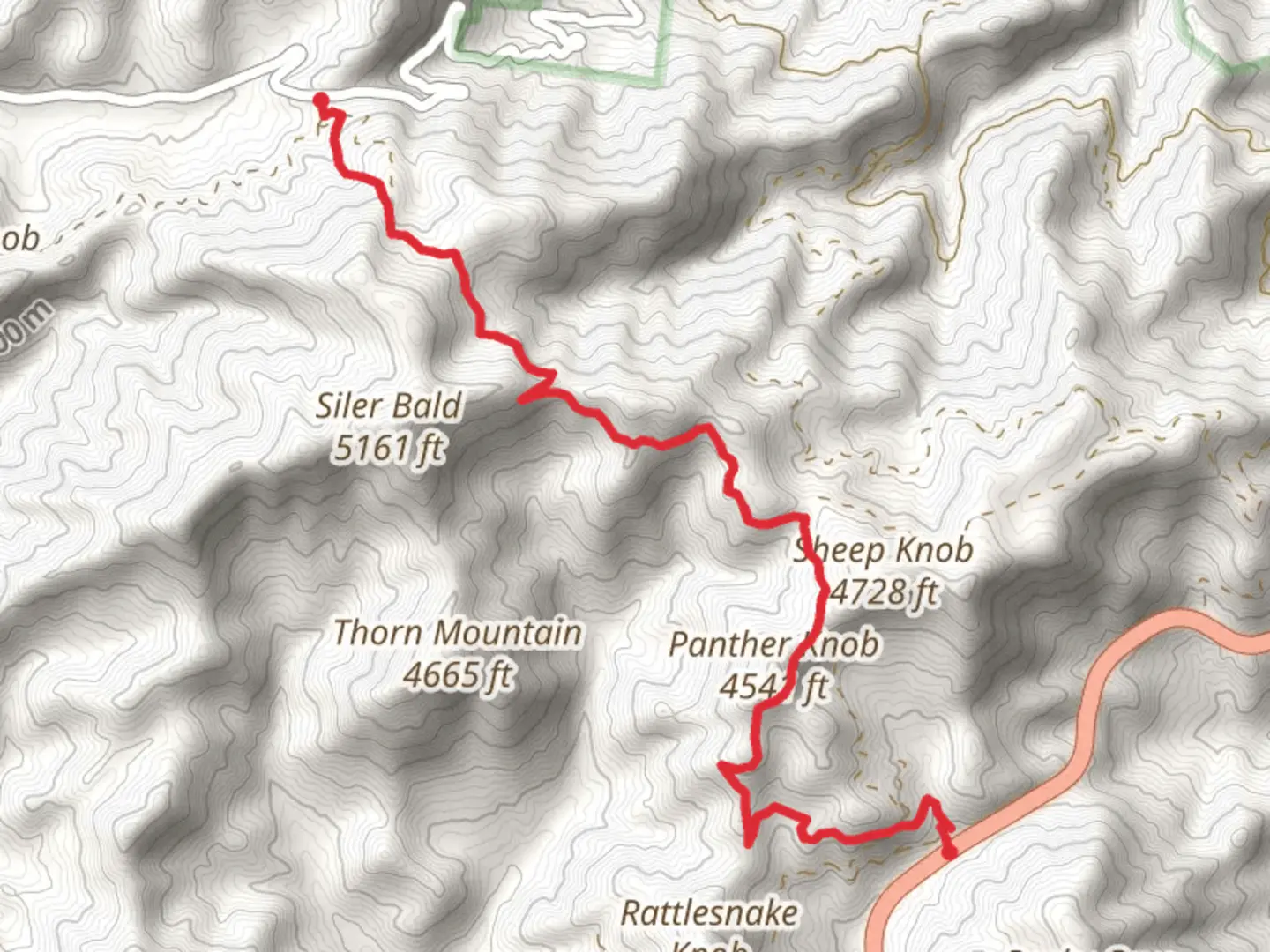 An image depicting the trail Wayah Crest to Winding Stair Gap via Appalachian Trail and its surrounding area.