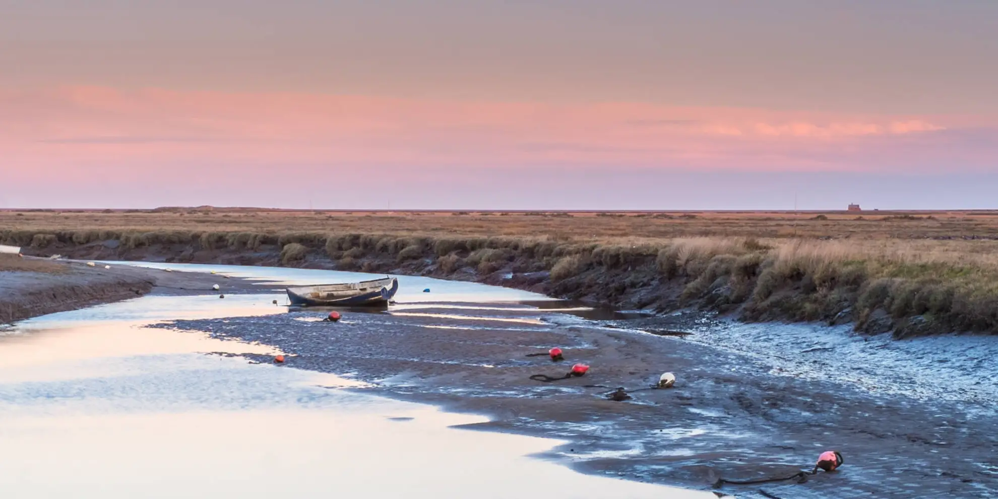 An image depicting the trail Cley next the Sea from Blakeney and its surrounding area.