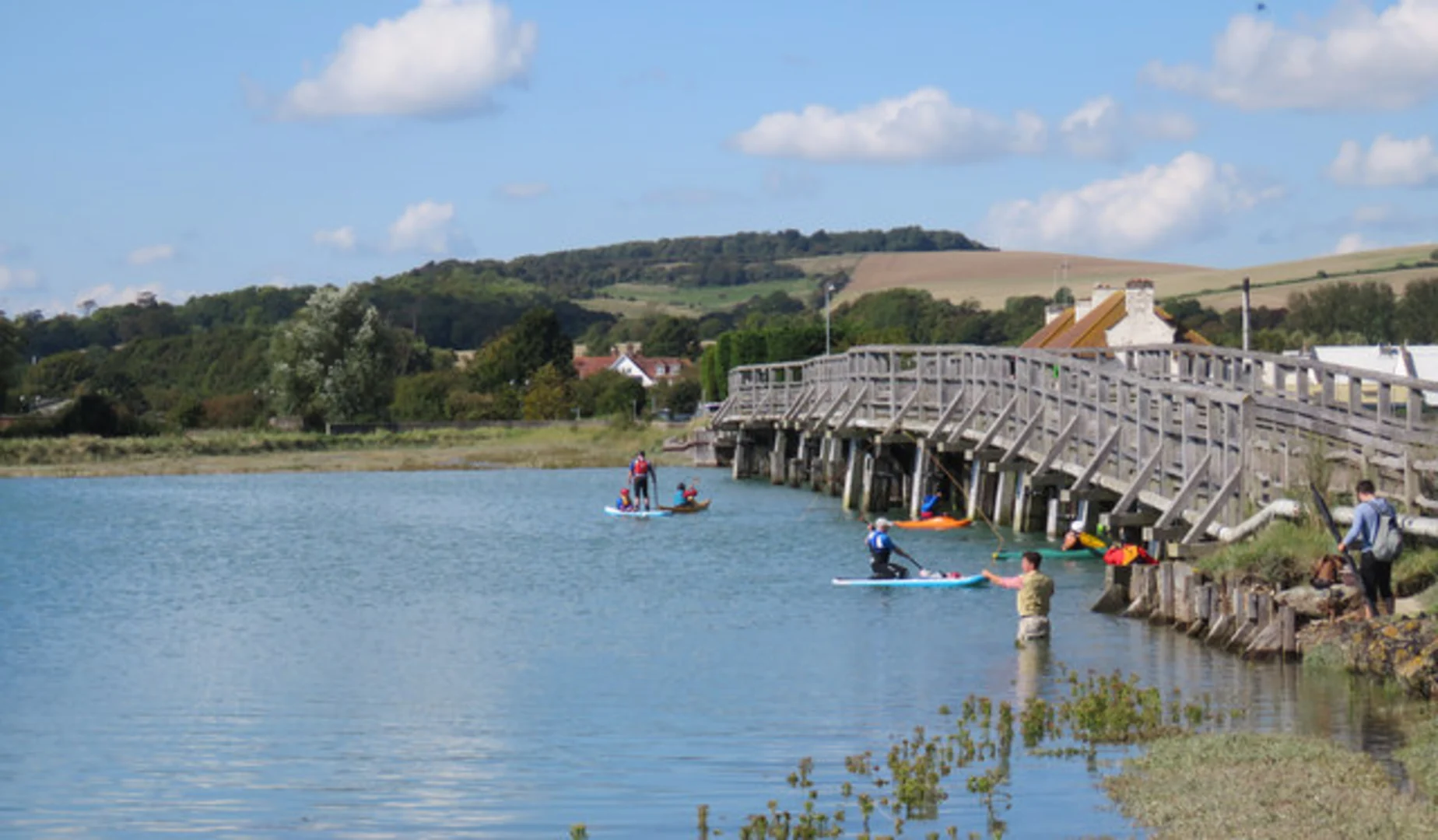An image depicting the trail Old Shoreham Bridge and River Adur via Downs Link and its surrounding area.