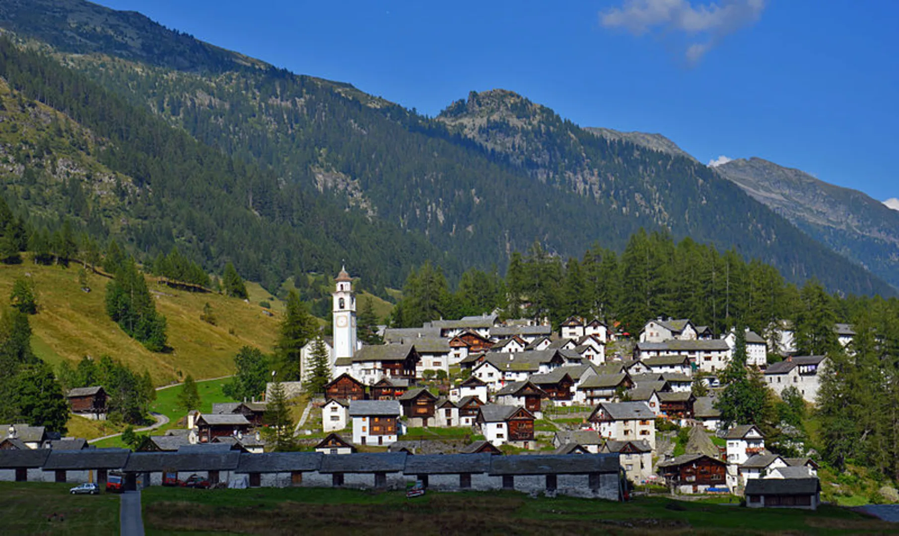 An image depicting the trail Cerentino to Bosco Gurin and its surrounding area.