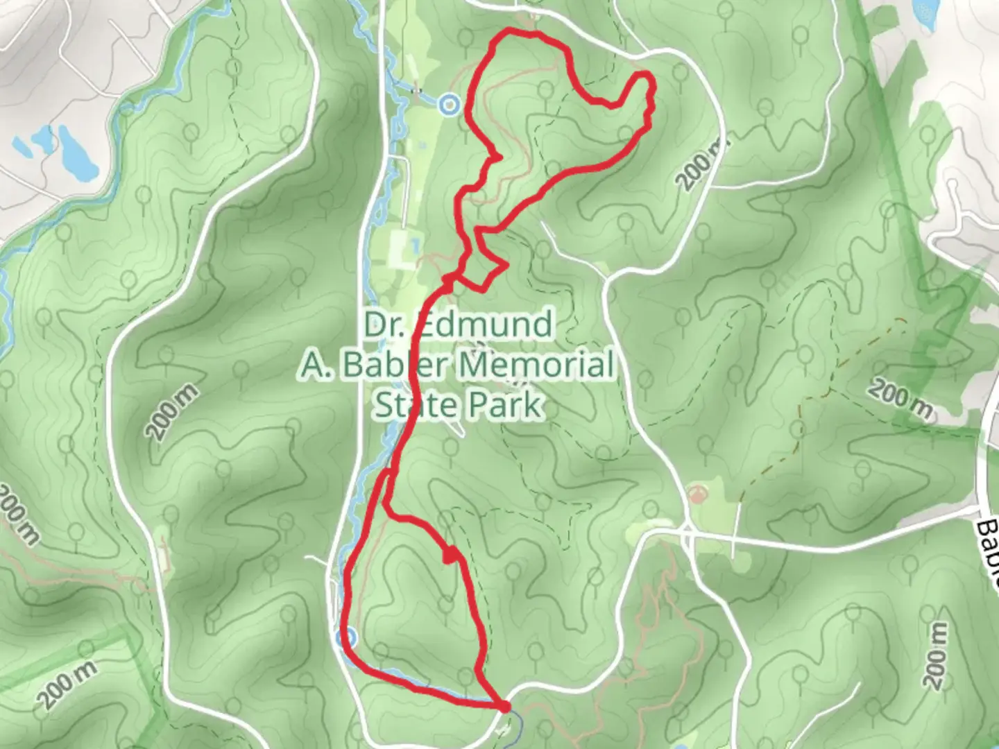 An image depicting the trail Dogwood and Woodbine Loop Trail and its surrounding area.