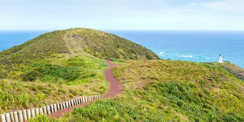 An image depicting the trail Cape Reinga Lighthouse Trail and its surrounding area.