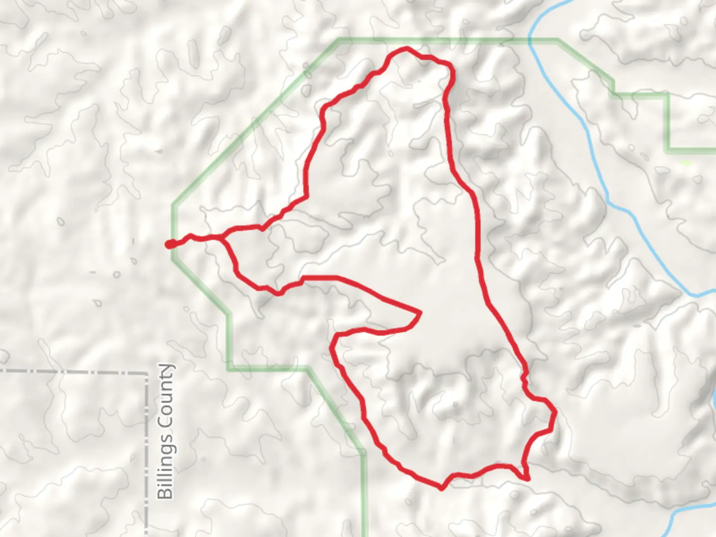 An image depicting the trail Maah Daah Hey Trail and Lone Tree Spring Loop Trail and its surrounding area.