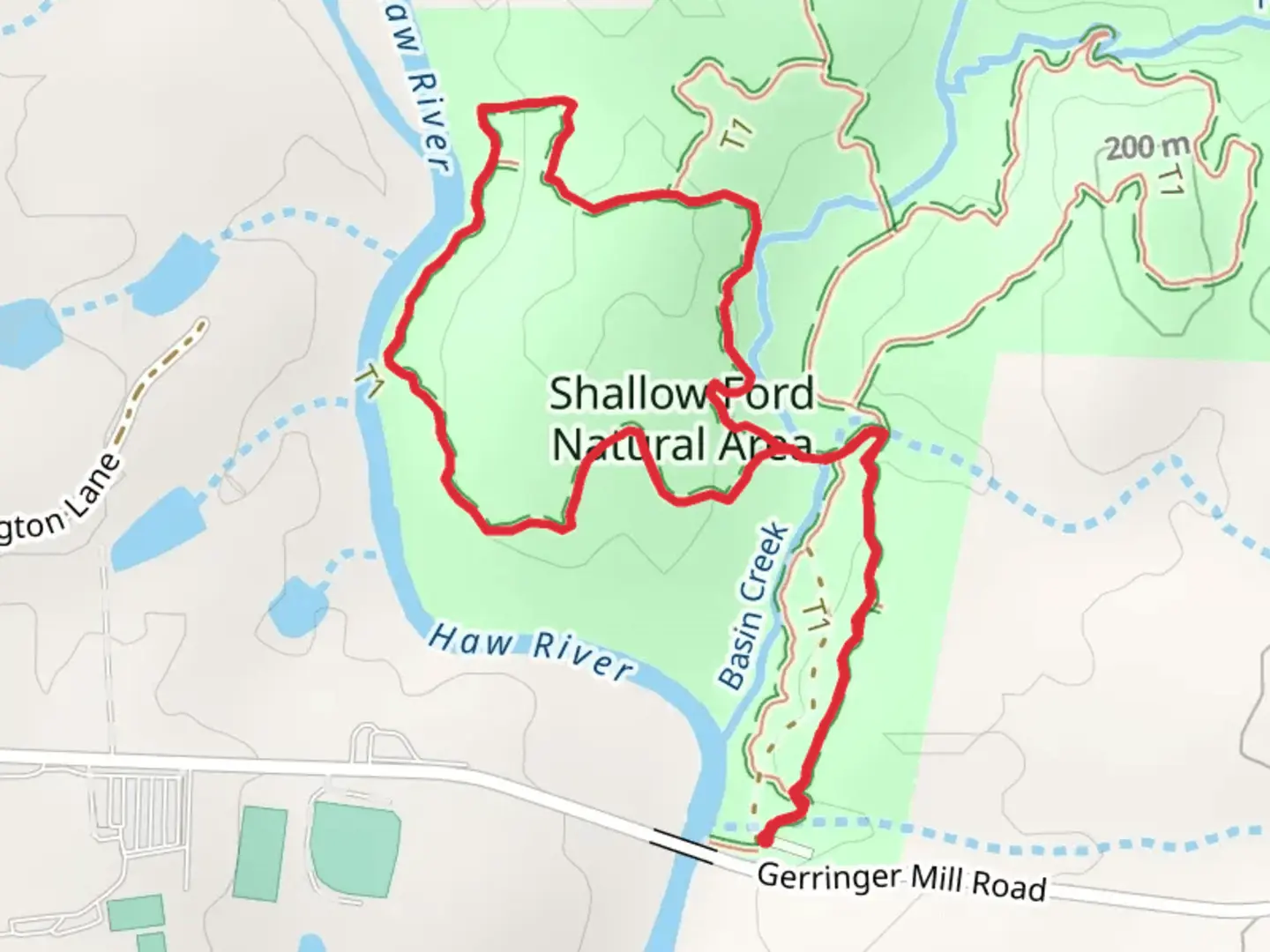 An image depicting the trail Basin Creek and Haw River Land Loop Trail and its surrounding area.