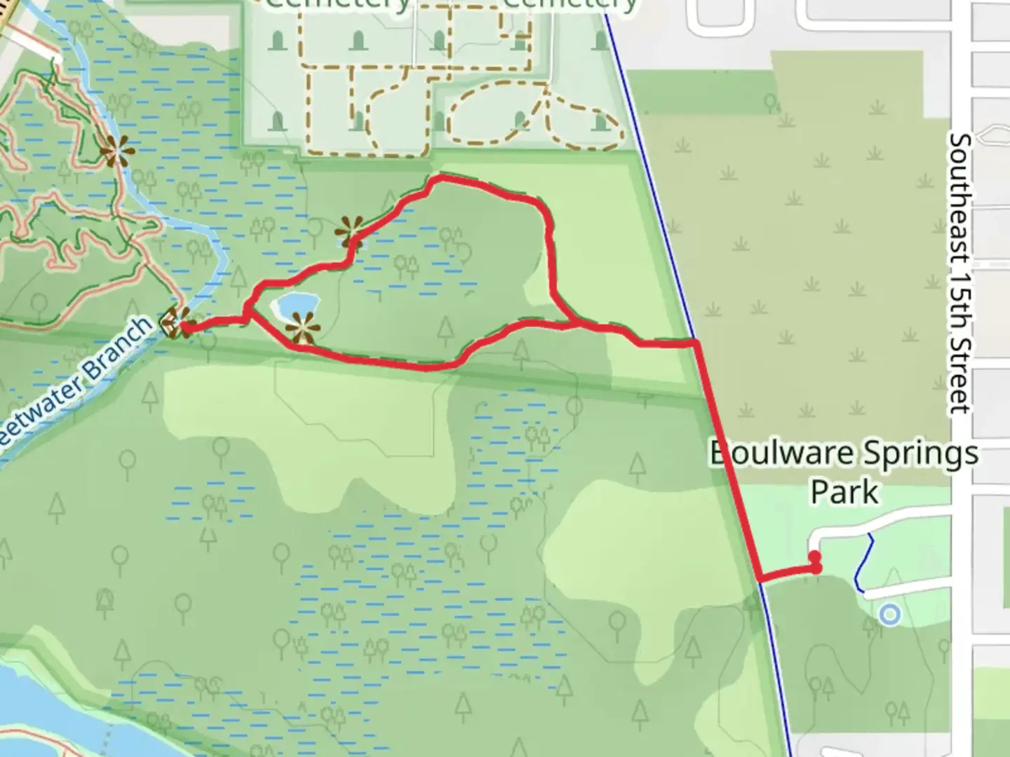 An image depicting the trail Sinkhole Pond via East Trail and its surrounding area.