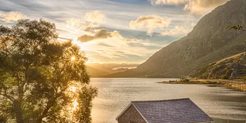 An image depicting the trail Carneddau from Capel Curig and its surrounding area.