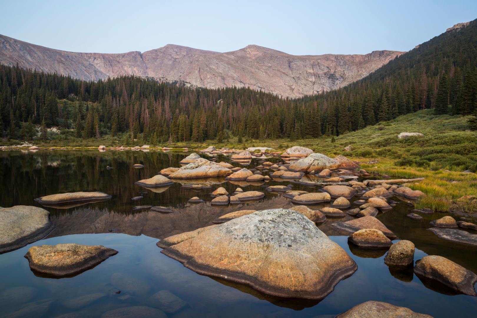 An image depicting the trail Mount Spalding and Mount Evans Trail from Summit Lake and its surrounding area.