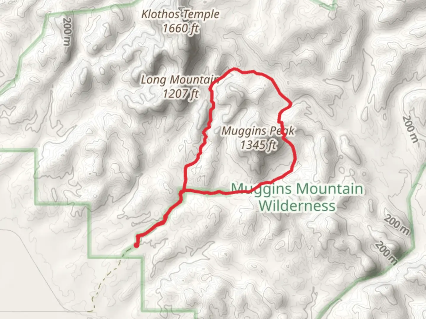 An image depicting the trail Muggins Wash and Peak Loop and its surrounding area.