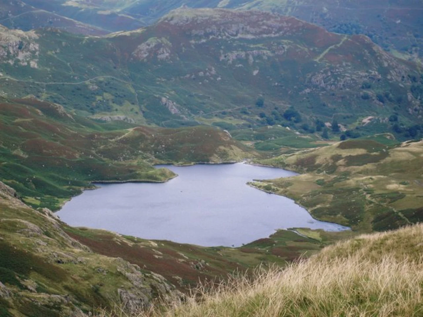 An image depicting the trail Easedale Tarn, Calf Crag, Gibson Knott and Helm Crag Loop and its surrounding area.