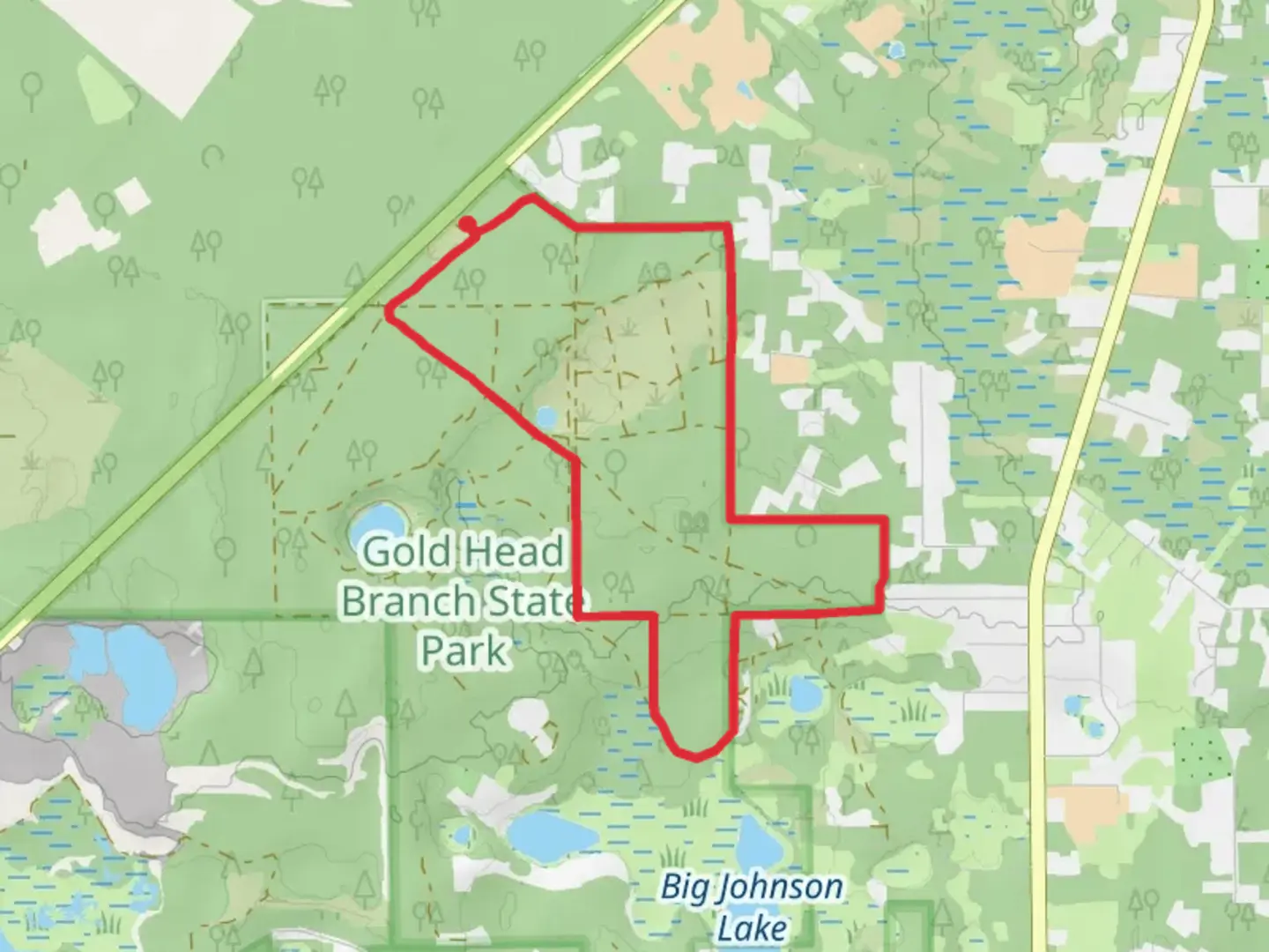 An image depicting the trail Mike Roess Gold Head Branch State Park Loop and its surrounding area.