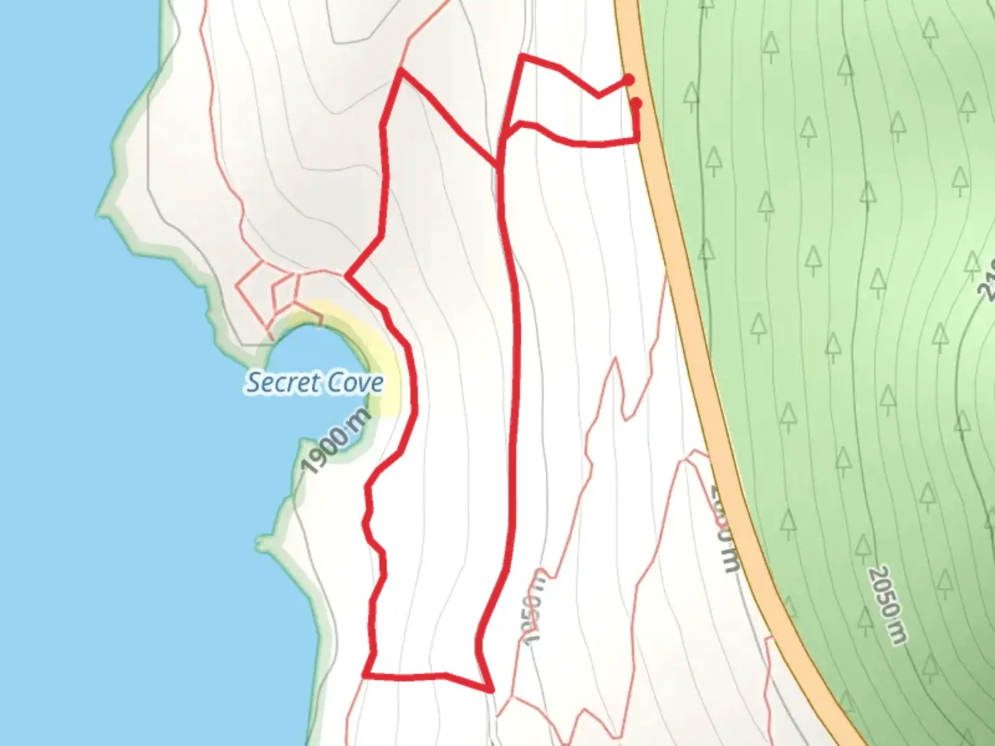 An image depicting the trail Secret Cove Beach Loop and its surrounding area.