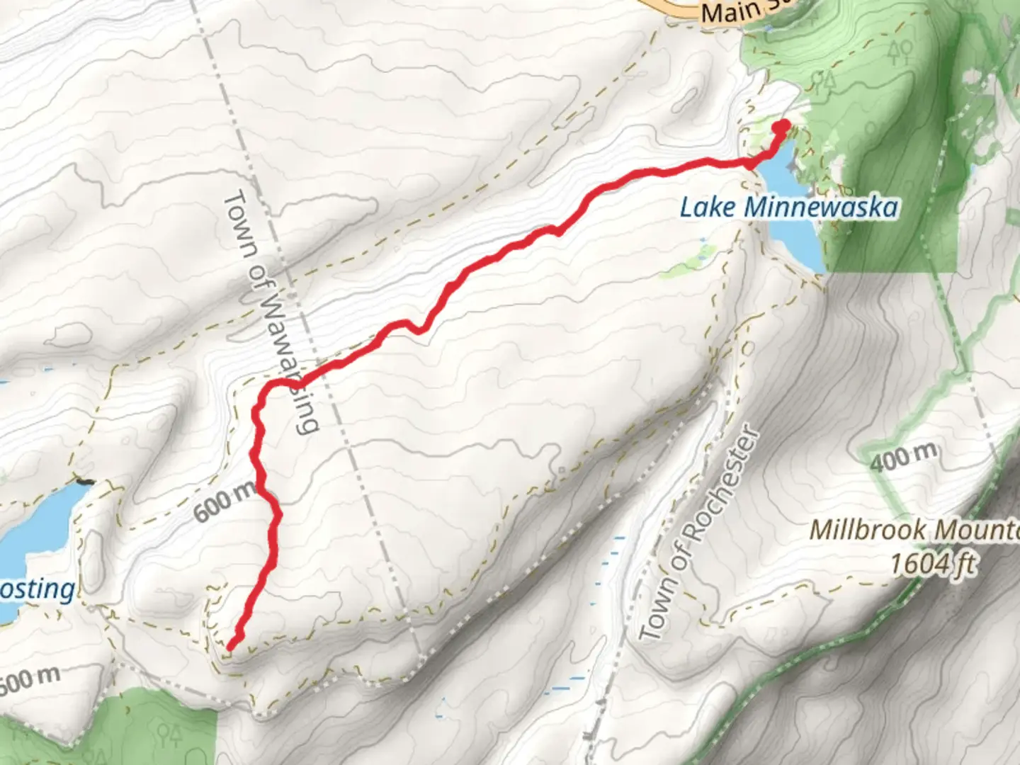 An image depicting the trail Castle Point from Lake Minnewaska Carriage Road - Red and its surrounding area.