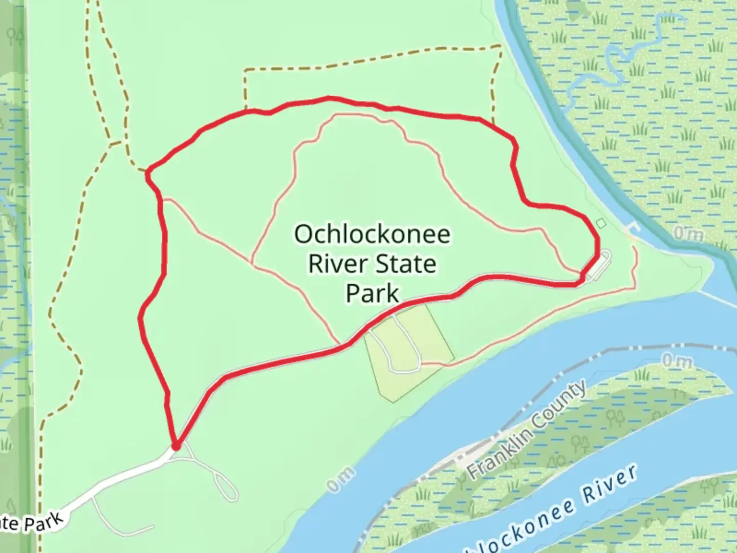 An image depicting the trail Ochlockonee River State Park Loop and its surrounding area.
