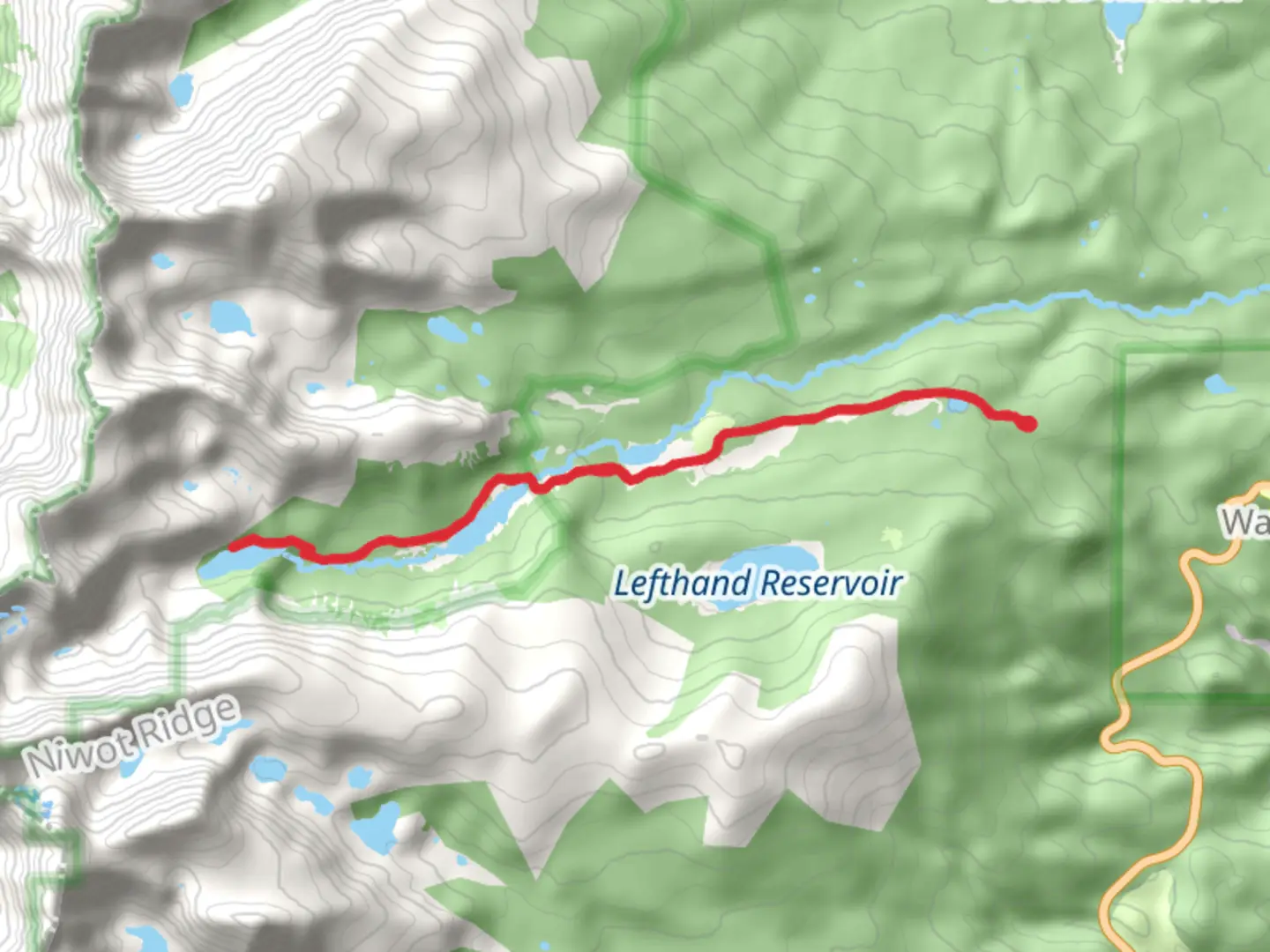 An image depicting the trail Lake Isabelle via Brainard Lake Road and its surrounding area.
