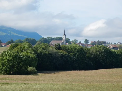 An image depicting the trail Romont Stained Glass Trail and its surrounding area.