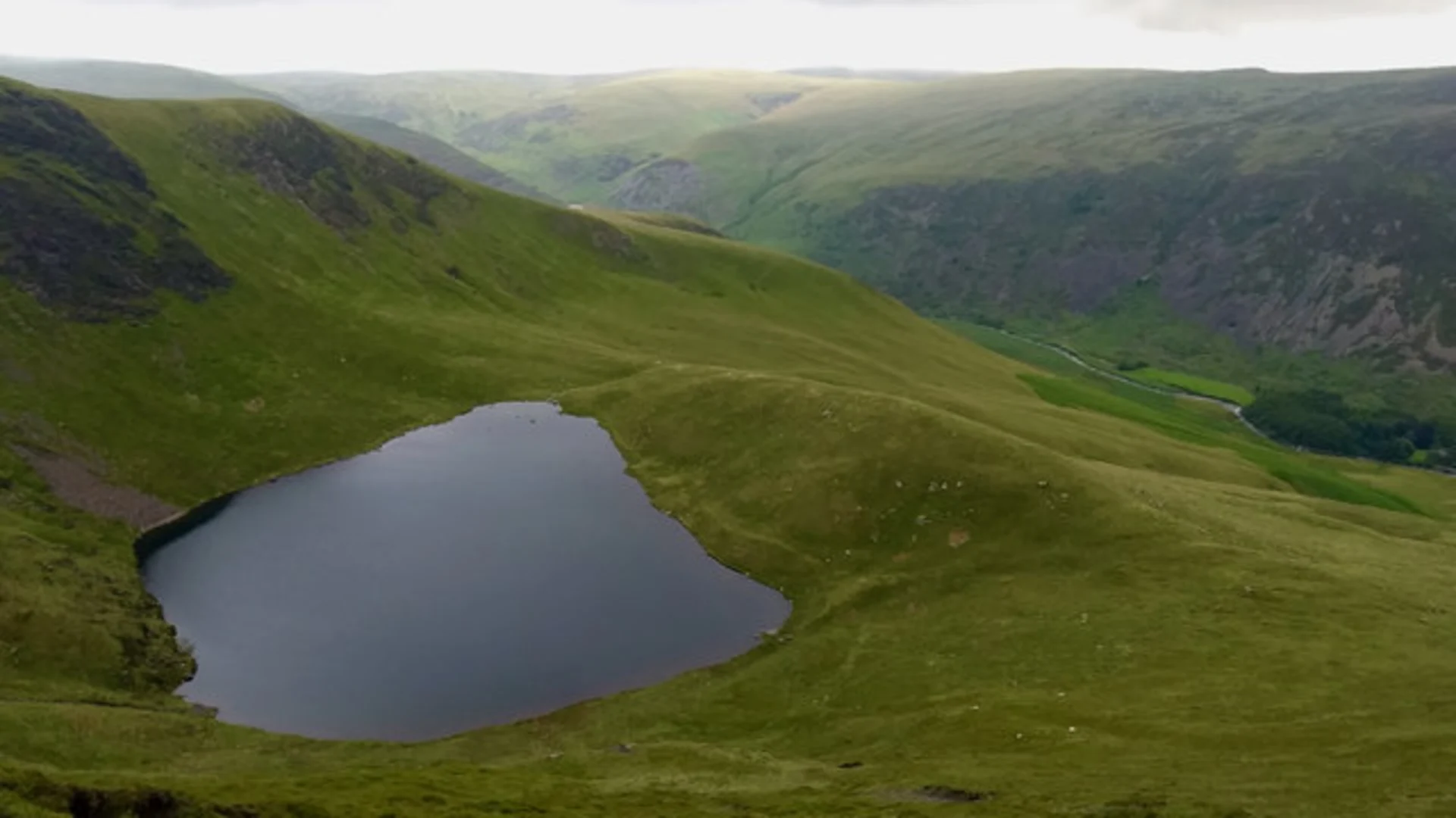 An image depicting the trail Scales Tarn and Blencathra Loop - Mungrisdale and its surrounding area.