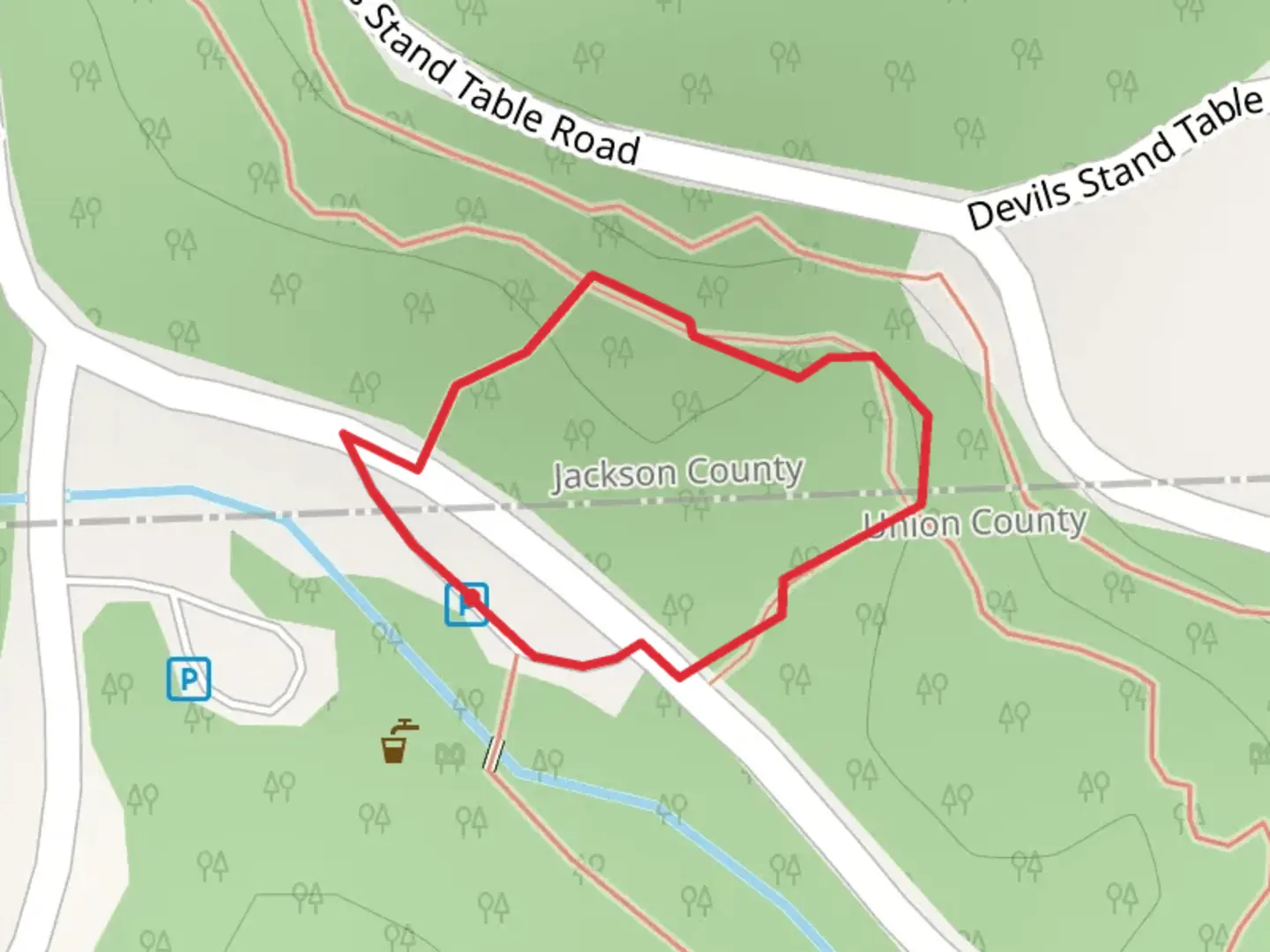 An image depicting the trail Devil's Standtable Loop Trail and its surrounding area.