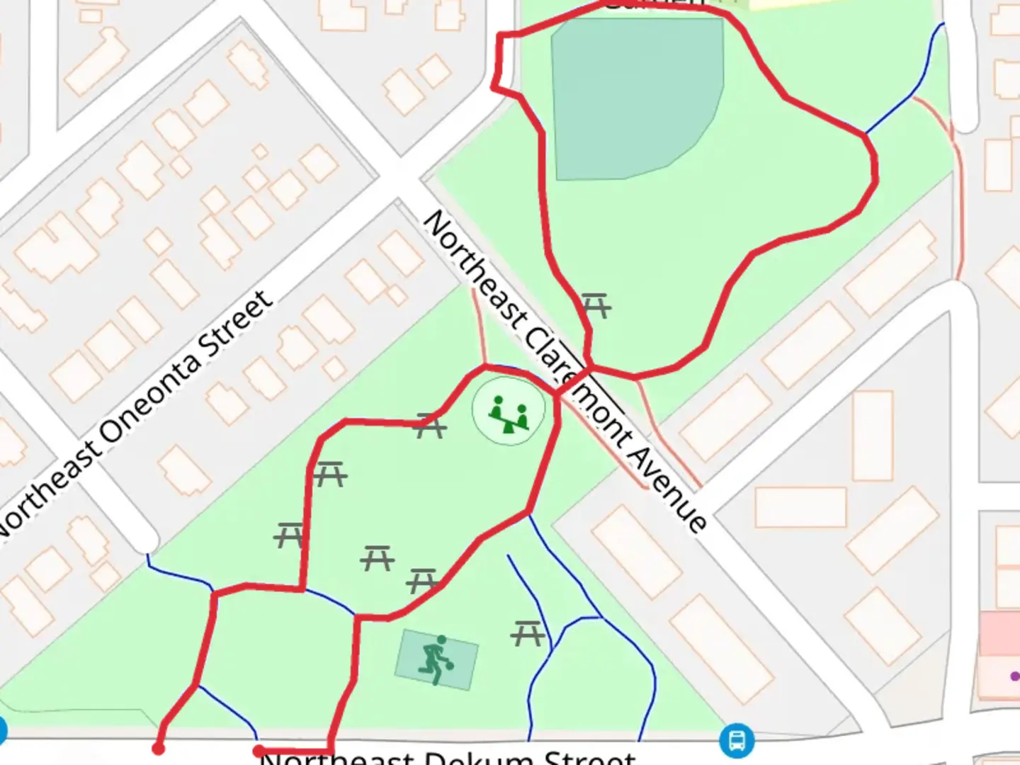 An image depicting the trail Woodlwan Park and Woodlawn Community Garden Loop and its surrounding area.