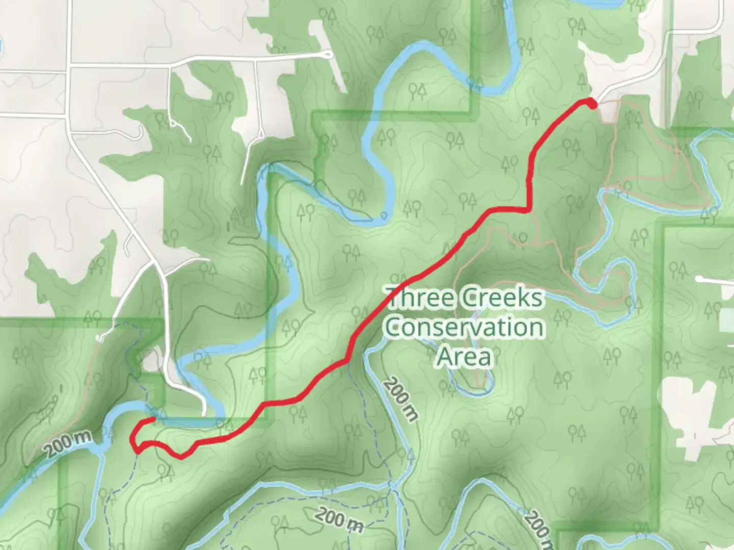 An image depicting the trail Three Creeks Conservation Area Walk and its surrounding area.