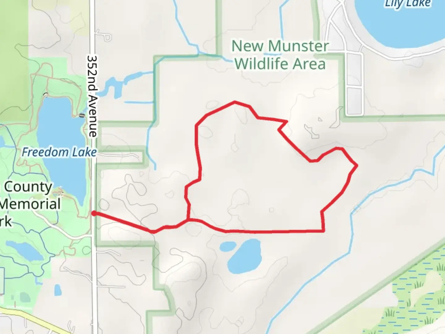 An image depicting the trail Loop Beside Freedom Lake and its surrounding area.