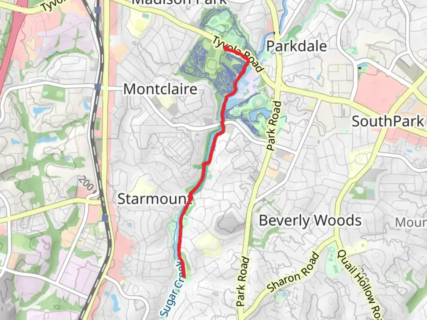 An image depicting the trail Little Sugar Creek Greenway and its surrounding area.