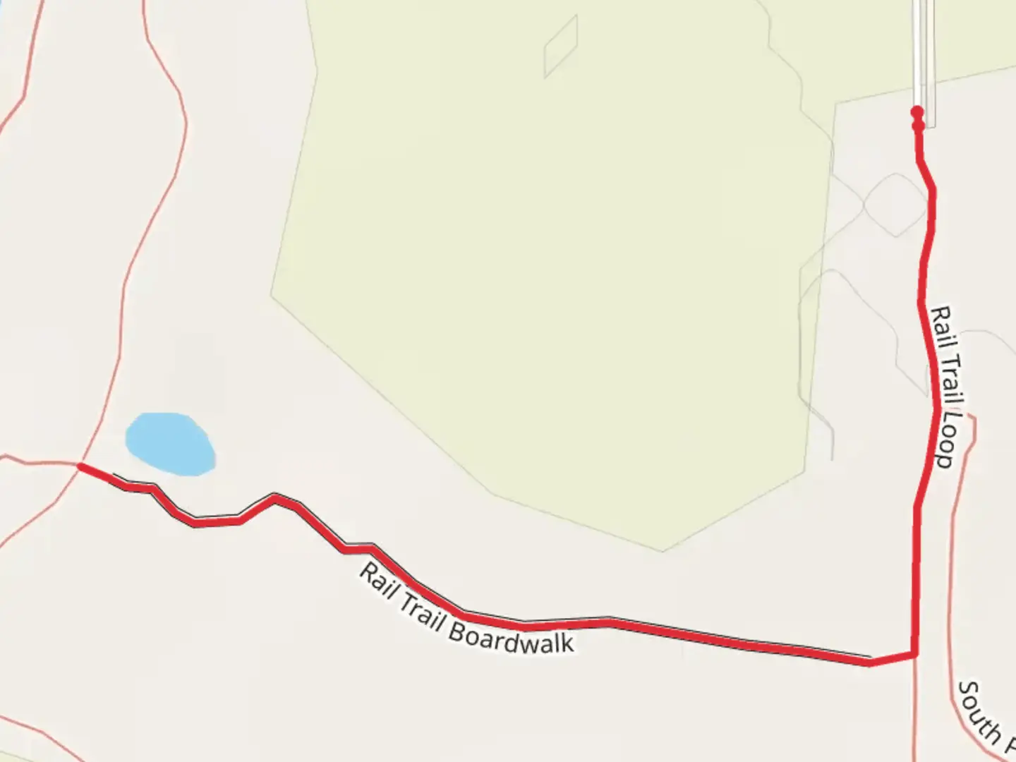 An image depicting the trail Rail Trail Boardwalk and its surrounding area.