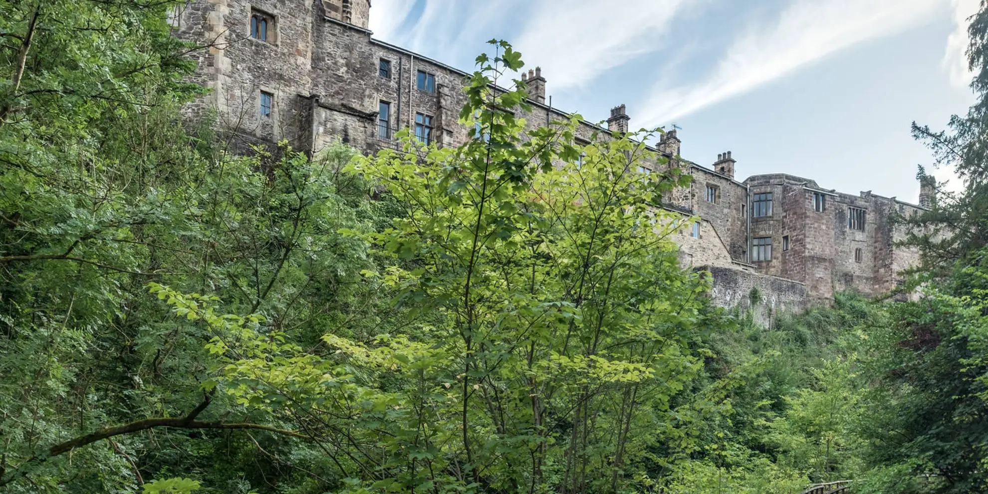 An image depicting the trail Skipton Castle Woods and its surrounding area.