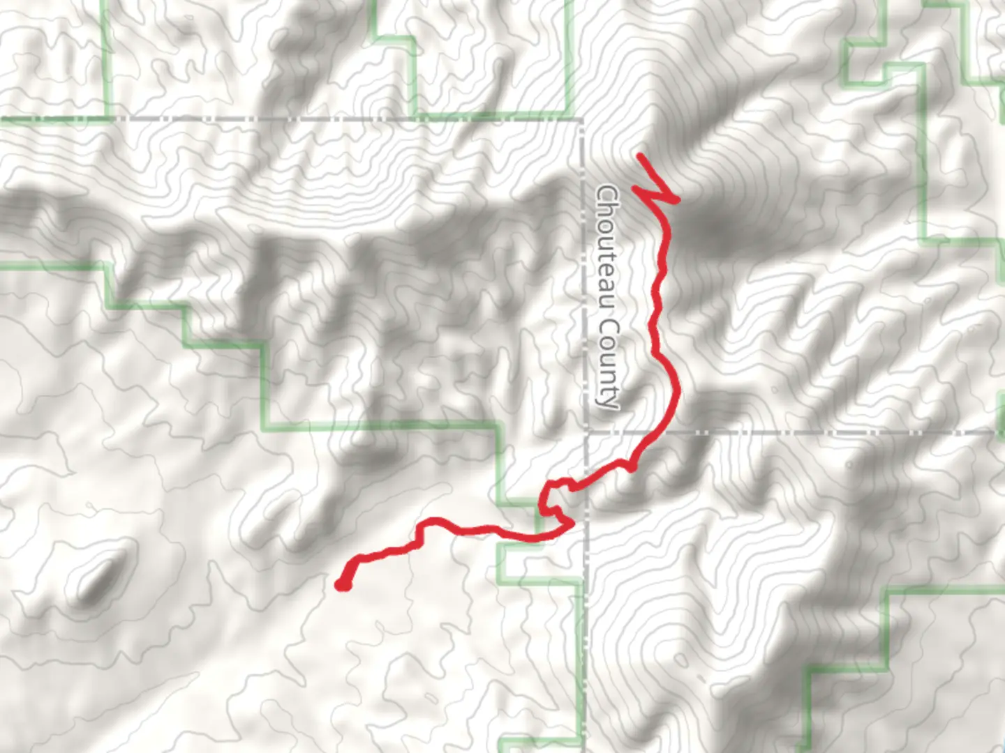 An image depicting the trail Highwood Baldy from Pinewood Lane and its surrounding area.