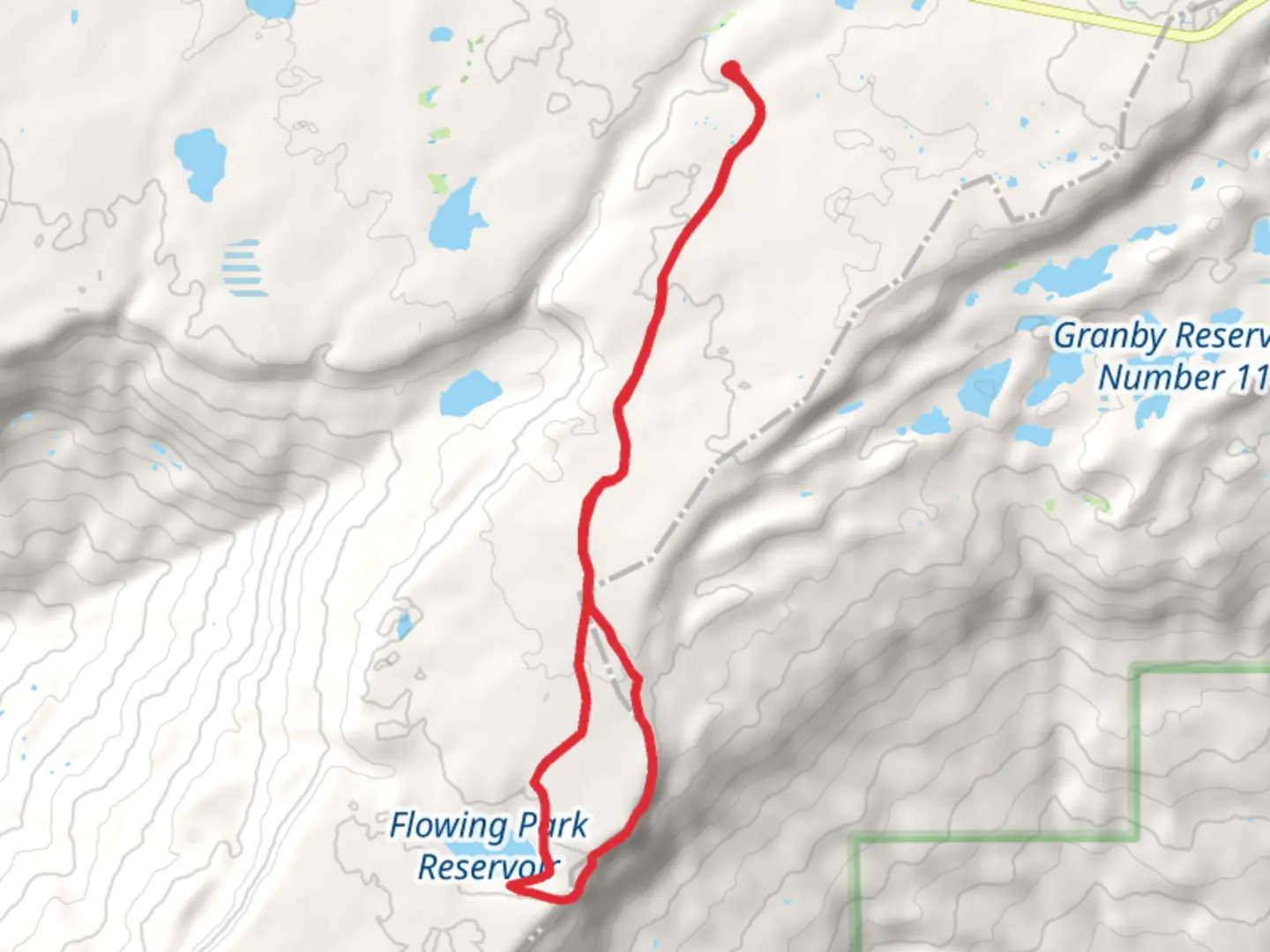 An image depicting the trail Flowing Park Reservoir Overlook Loop and its surrounding area.
