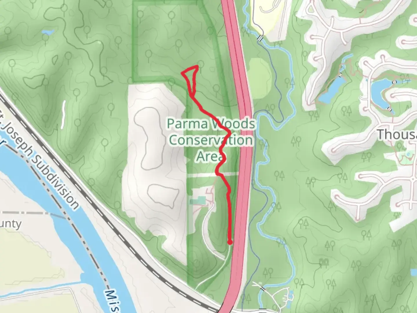 An image depicting the trail Parma Woods and its surrounding area.