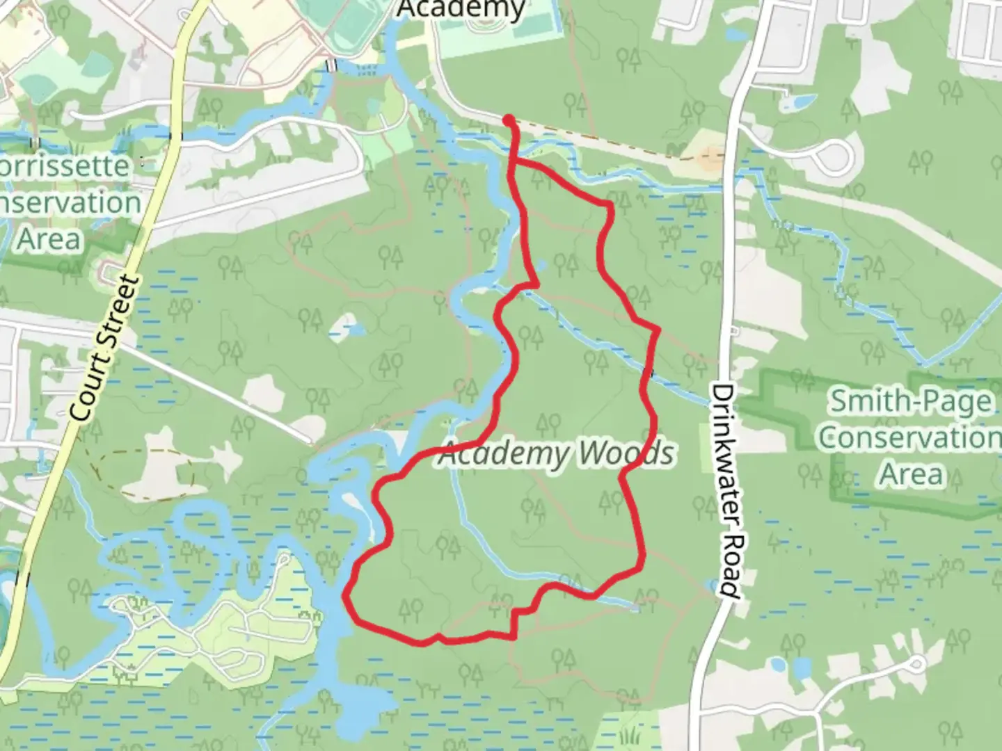 An image depicting the trail Academy Woods Loop Trail and its surrounding area.
