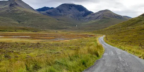 An image depicting the trail Garbh Bheinn's Great Ridge Loop from Inversanda and its surrounding area.