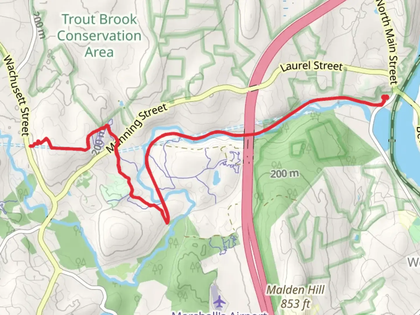 An image depicting the trail Quinapoxet River from Thomas Street and its surrounding area.