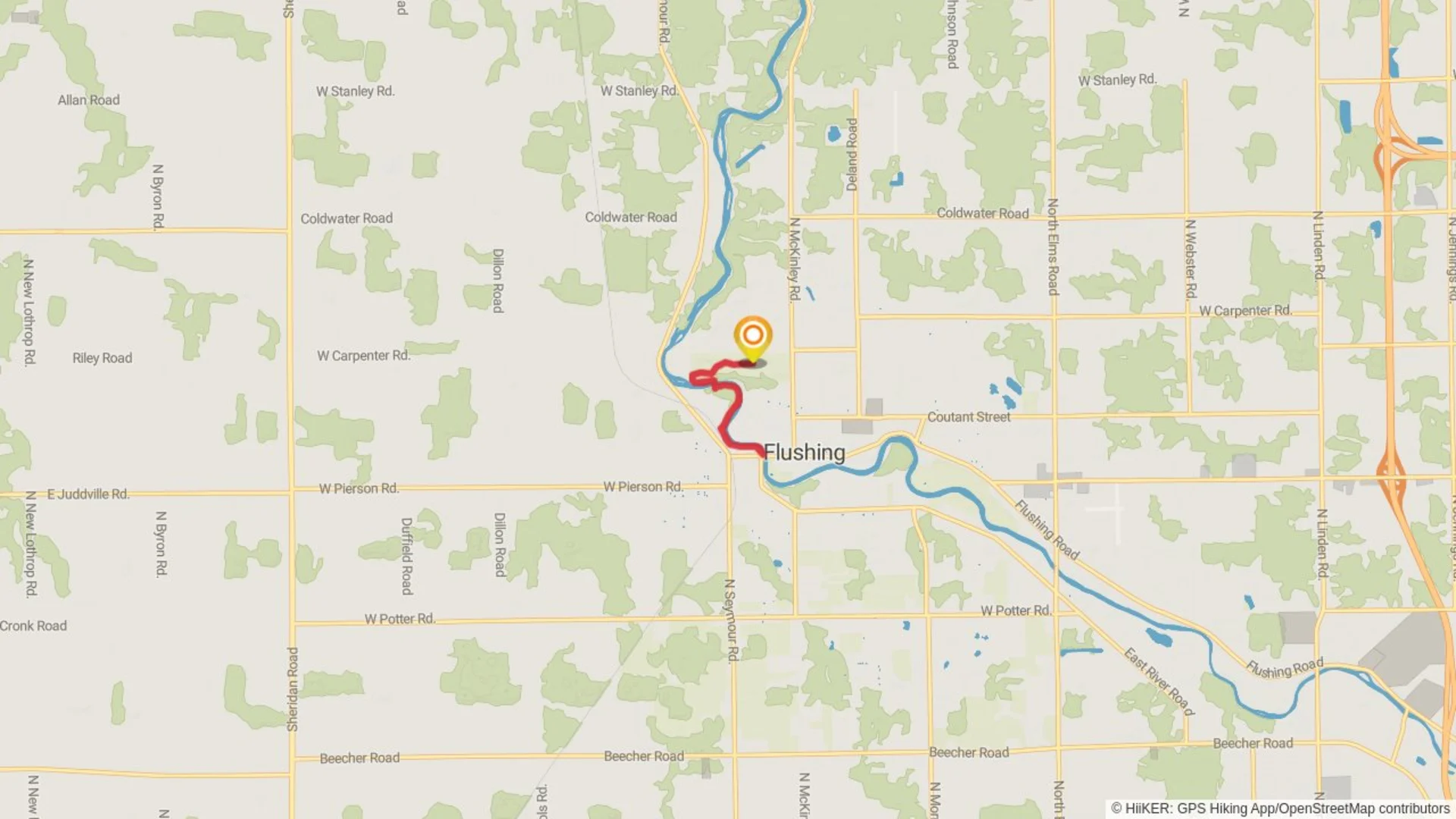 An image depicting the trail Flushing County Park via Flint River and its surrounding area.